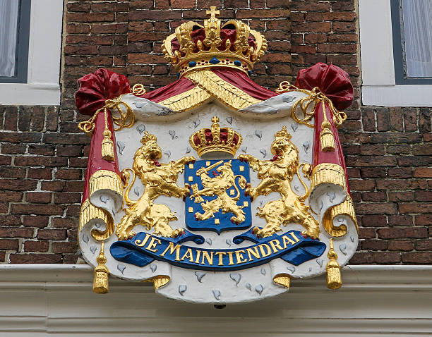 Coat of Arms with the motto Je Maintiendrai (I will hold) of the Dutch Royal Family on an old building in Zierikzee, the Netherlands. This coat of arms was created more than 200 years ago, no property release is required.