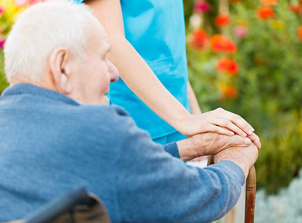 istock Care for Elderly in Wheelchair 486832287