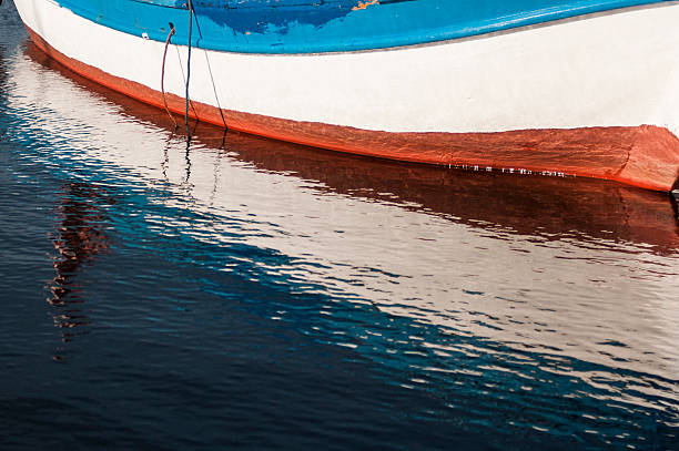 istock Reflection of a boat over the sea. 486835742