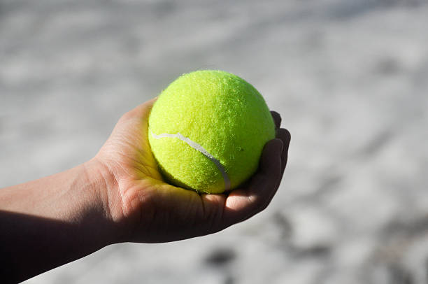 istock Tennis ball in his hand 486836759