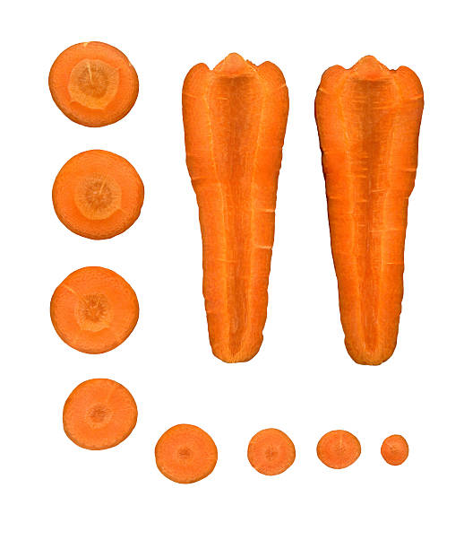 istock Fresh vegetables carrots cut into pieces on a white background. 486839350