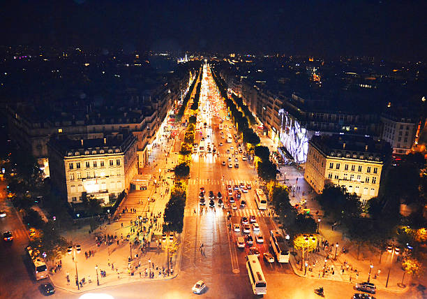 istock Paris Traffic at Night From the Arc de Triomphe 486839710