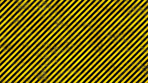 grunge linee di pericolo - safety yellow road striped foto e immagini stock