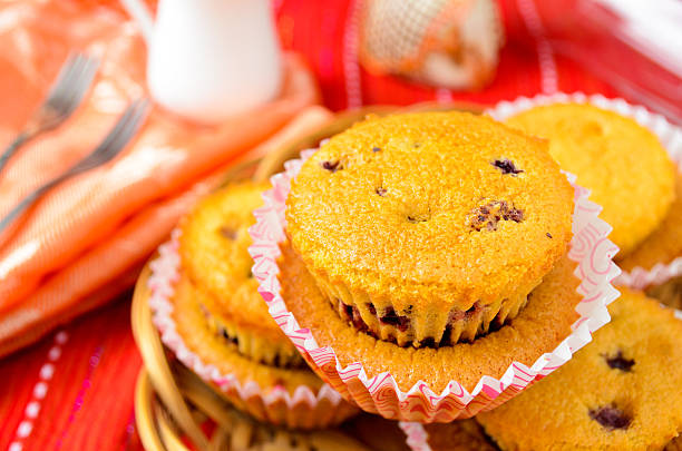 istock Homemade blackcurrent muffins in paper cupcake holder 486841418