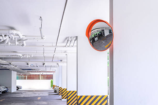 istock Traffic convex mirror at car park. 486841984