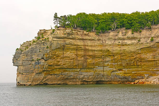 istock Lakeshore Cliff in the Fog 486843118