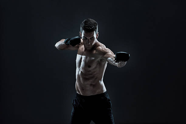 istock Mixed martial arts player in action 486843424