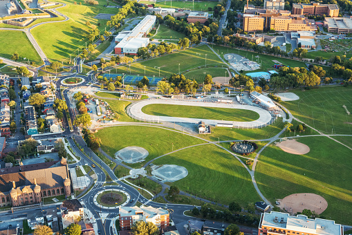 An aerial view of the Halifax Commons, a large public green space featuring a rollerskating/skating oval, baseball diamonds, soccer field, skate park and pool.  Taken from an altitude of 800'.