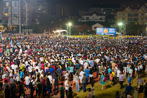 Singapore Singapore - September 08, 2015: Massive crowd attending the political rally by Singapore Democratic Party at Serangoon Stadium, located at Serangoon New town Central, North-East Region of Singapore.