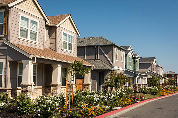 Row of New Houses A row of newly-built houses in a residential subdivision. southern california stock pictures, royalty-free photos & images