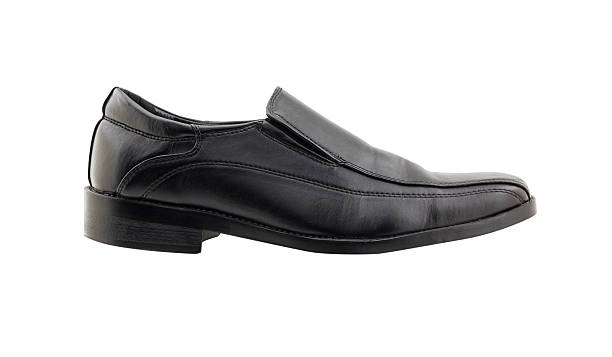 istock Black leather shoes isolated on white background 486848236
