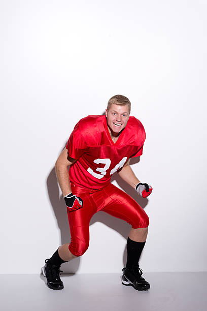 istock Excited American football player 486848636
