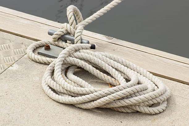 istock Yachting, white rope and mooring bollard 486854070