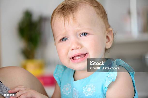 Small Baby Crying Stock Photo - Download Image Now - Teething Toy, Baby - Human Age, Pain