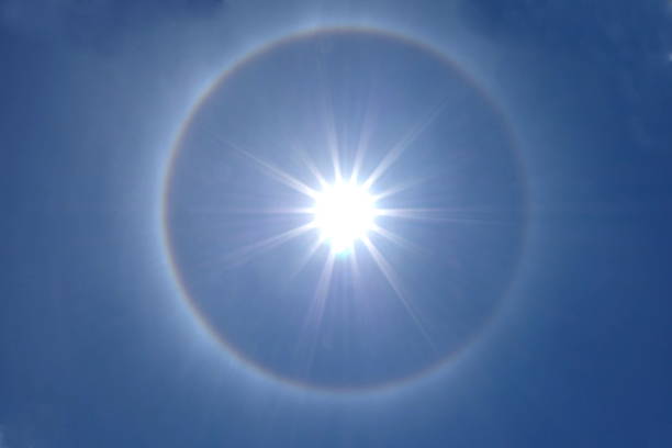 istock beautiful sun halo on clear blue sky 486859304