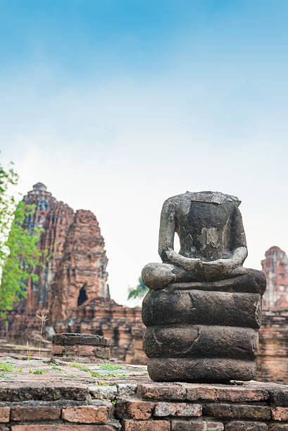 istock Ruins of ancient broken buddha at Ayuttaya, Thailand 486859919