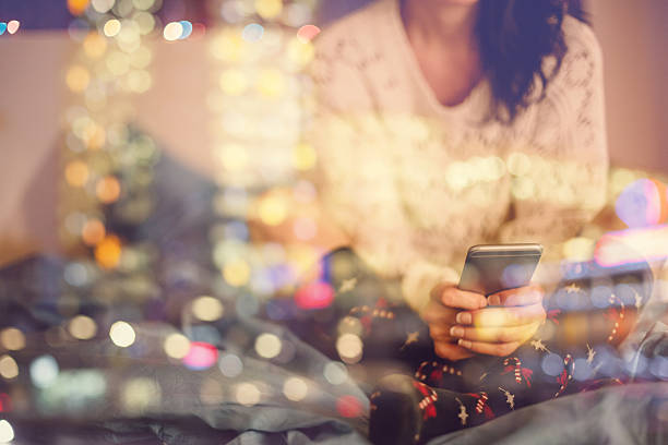 istock Girl in bed texting on smartphone 486862262