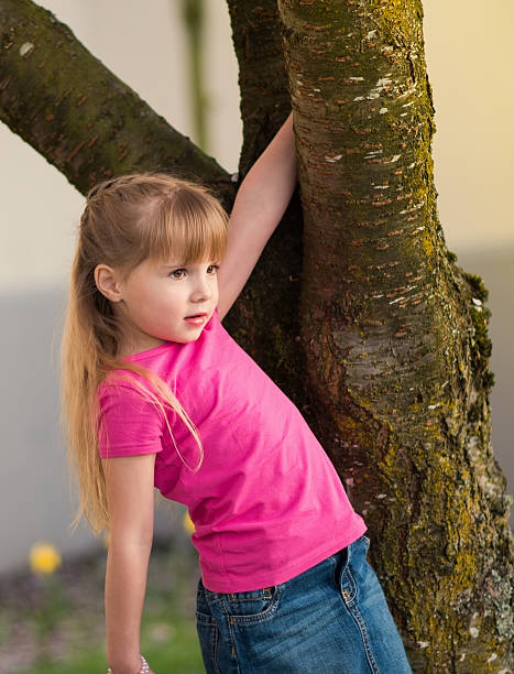 istock Little girl having fun outdoors. 486862697