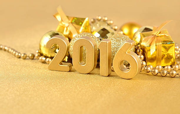 istock year 2016 golden figures and golden Christmas decorations 486863634