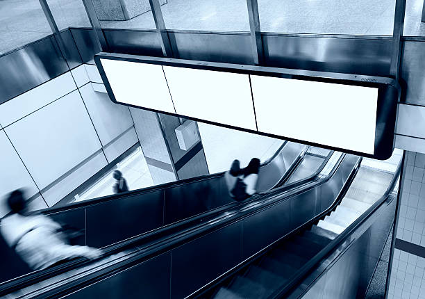 People in suits rushing during a busy hour in finance building.