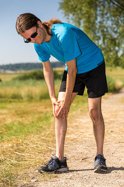 istock Jogger having a knee pain 486863958