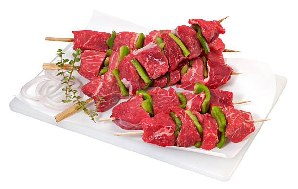 Raw beef brochettes stock photo