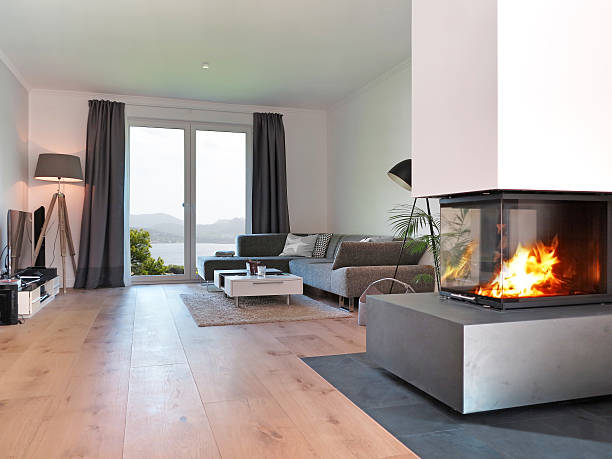 modern living room with fire place stock photo