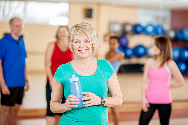 istock Woman Relaxing After Fitness Class 486876374