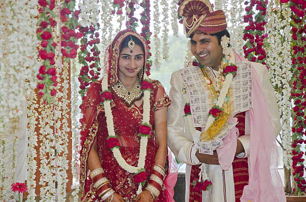 istock Happy Indian couple at their wedding. 486876602