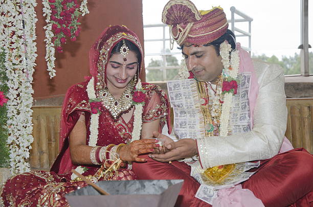 istock Happy Indian couple at their wedding. 486876660