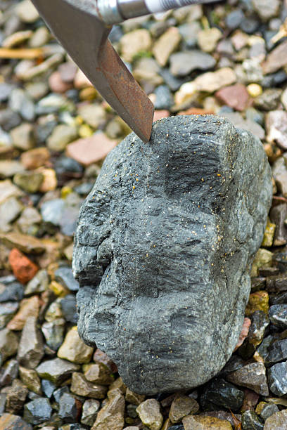 istock Geology hammer at the Jurassic Coast 486877670