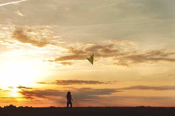 istock man with a girl launches a kite 486877734