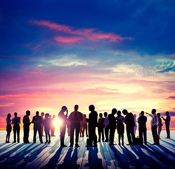 istock Back Lit Business People Discussion Skyline Concept 486878848