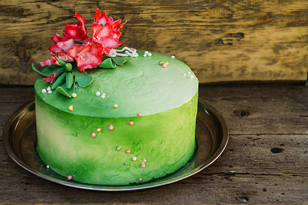 istock cake with sugar flowers on a wooden background 486879228