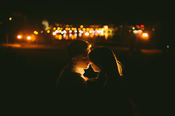 istock Couple at the night city 486879576