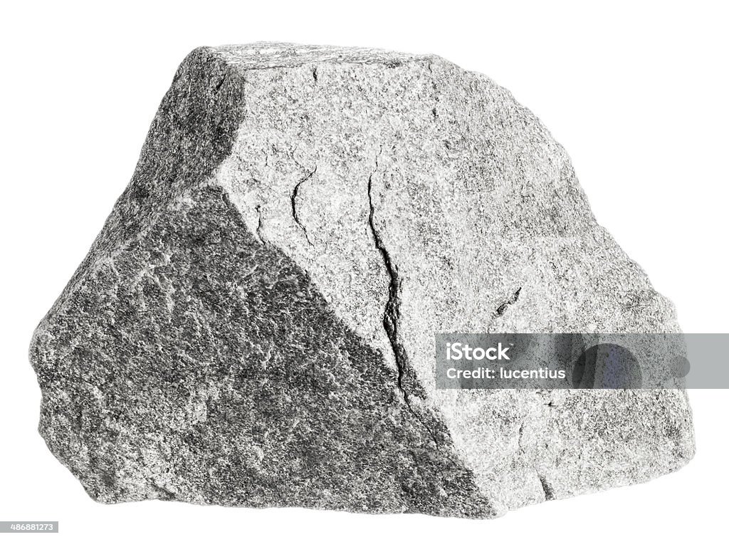 Rock isolated on white Grey colored quartzite rock isolated on white. Focus is front to back. Rock - Object Stock Photo