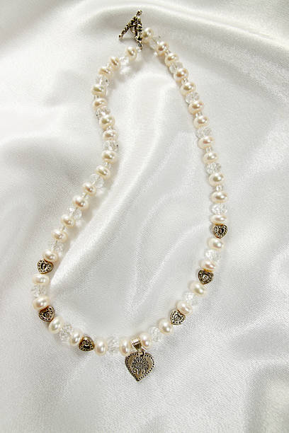 istock necklace of white pearls 486883731