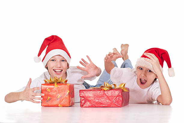 istock boys with christmas gifts 486884574