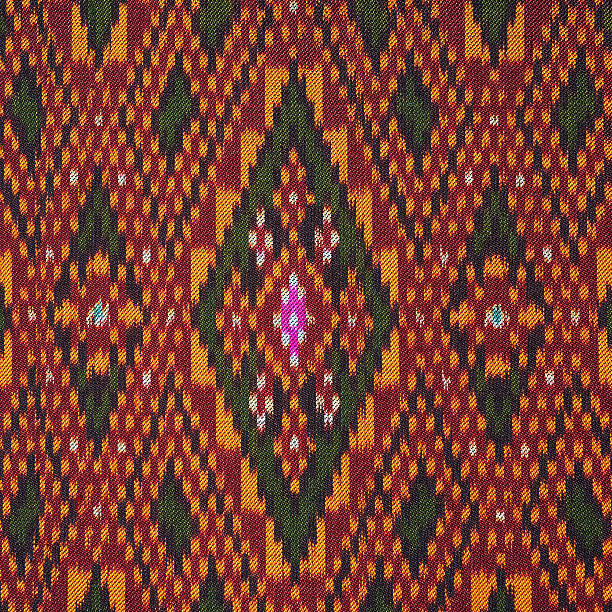 istock Colorful thai silk handcraft organic using natural dyes close up 486885488