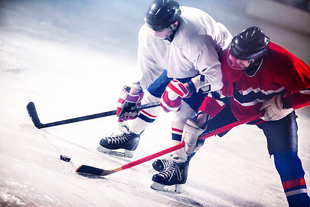 eishockey-spiel. - winter sport team sport hockey puck sport stock-fotos und bilder