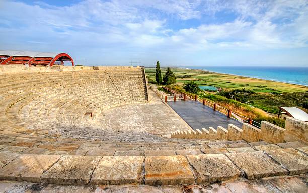 Ancient theatre of Kourion, Limassol, Cyprus The arcaeological site of the ancient city of Kourio which is located in the district of Limassol, Cyprus. A view of the ancient theatre and the beach from the hill. kourion stock pictures, royalty-free photos & images