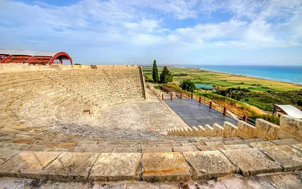 The arcaeological site of the ancient city of Kourio which is located in the district of Limassol, Cyprus. A view of the ancient theatre and the beach from the hill.