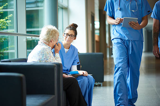 istock consoling a worried relative in the hospital 486888140