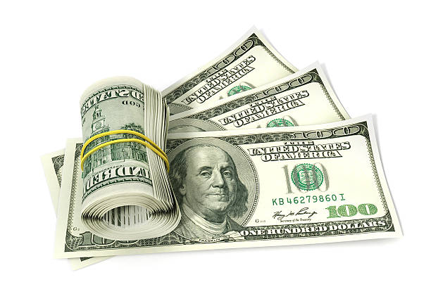 istock roll of dollars isolated on white 486888494