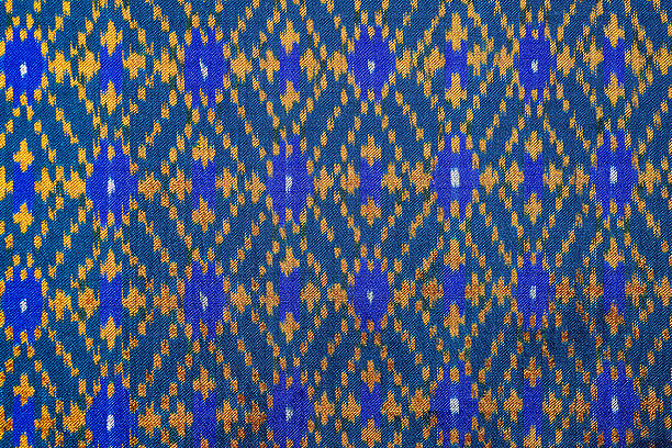 istock Colorful thai silk handcraft organic using natural dyes close up 486889302
