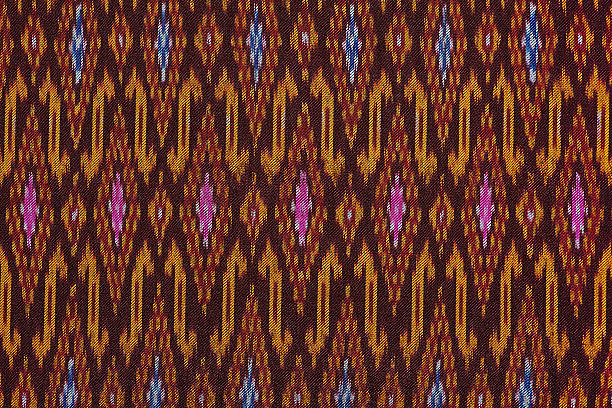 istock Colorful thai silk handcraft organic using natural dyes close up 486890814