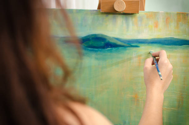 istock Woman painting 486893656