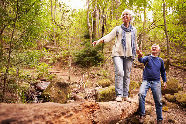 Senior couple walking together in a forest