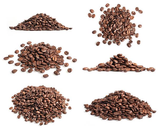 Collection of coffee beans heap on white