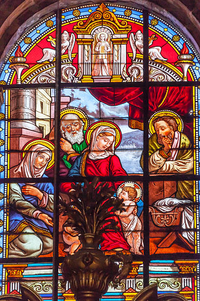 istock Baby Jesus John Mary Stained Glass Cathedral Granada Spain 486896109